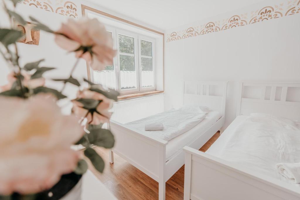 Postel nebo postele na pokoji v ubytování Penzion Račí údolí