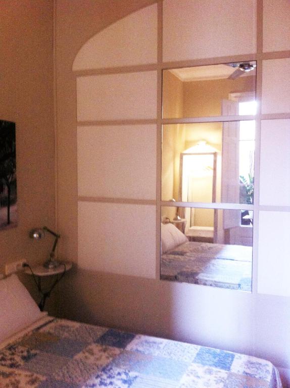 Posteľ alebo postele v izbe v ubytovaní Casa del Mediterraneo