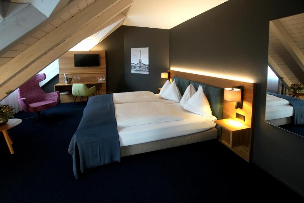 Postel nebo postele na pokoji v ubytování Hotel-Restaurant Löwen