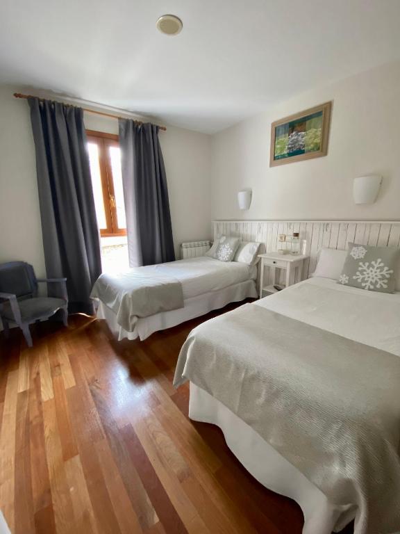 Postel nebo postele na pokoji v ubytování Hotel Casa Socotor
