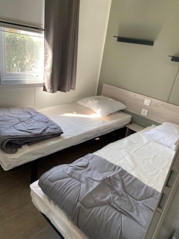 Postel nebo postele na pokoji v ubytování Vos meilleures vacances au Montourey!