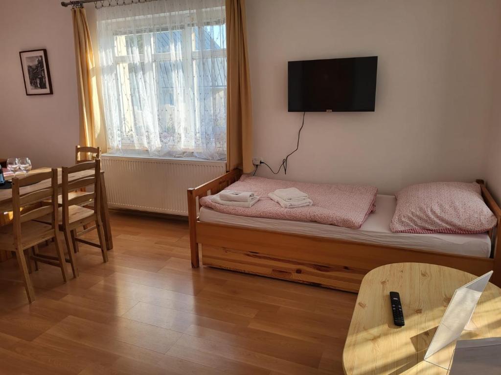 Postel nebo postele na pokoji v ubytování Pension Family