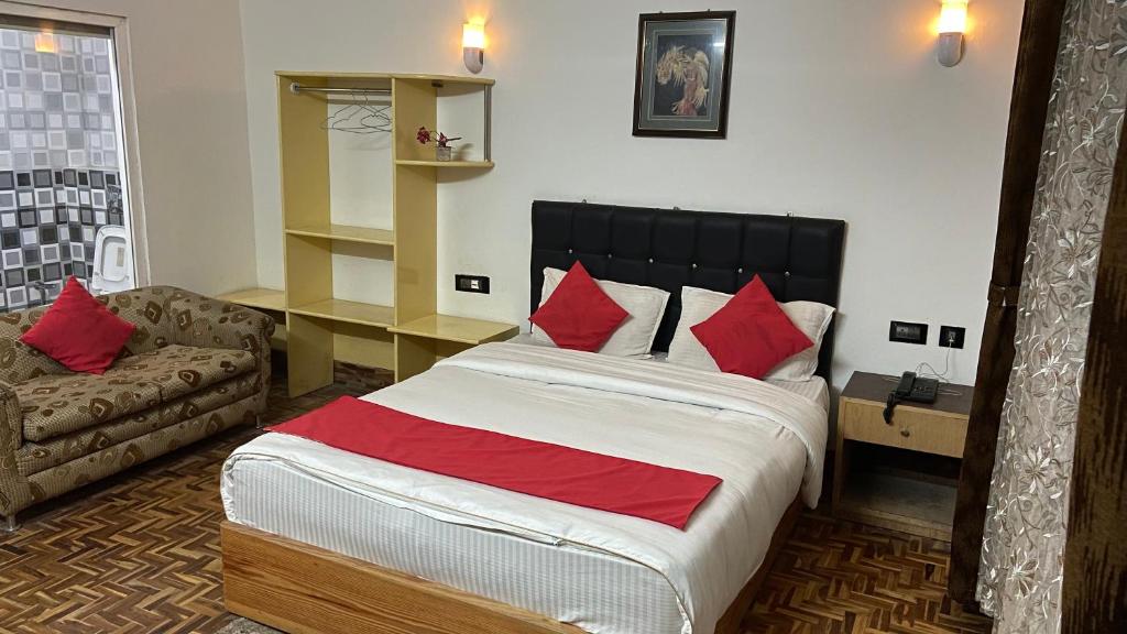Postel nebo postele na pokoji v ubytování Hidden Gem Residency