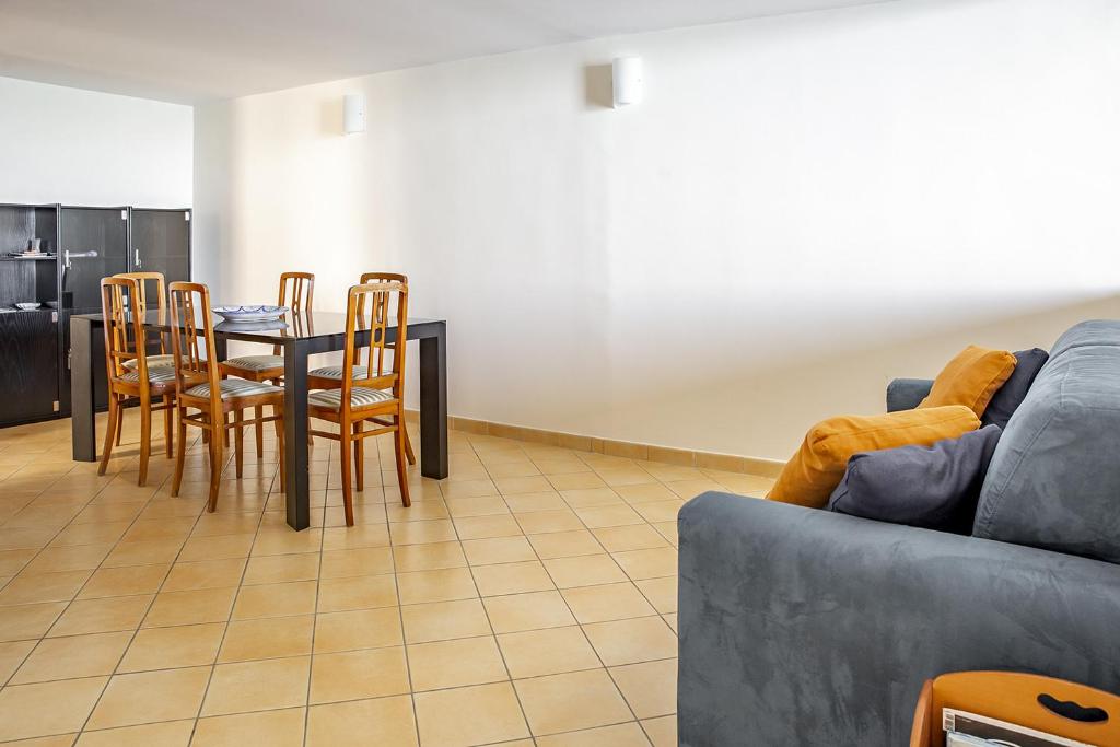 A seating area at Duplex sul porto grande by Wonderful Italy