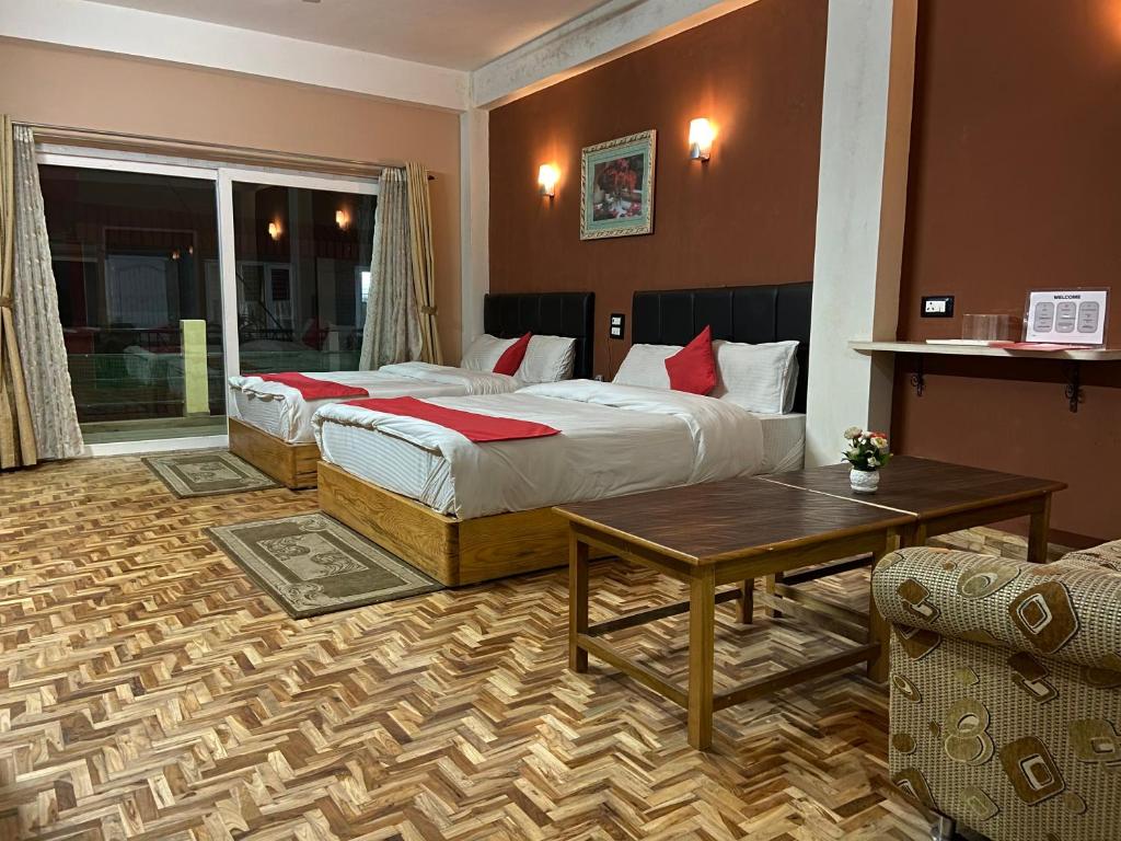 Postel nebo postele na pokoji v ubytování Hidden Gem Residency