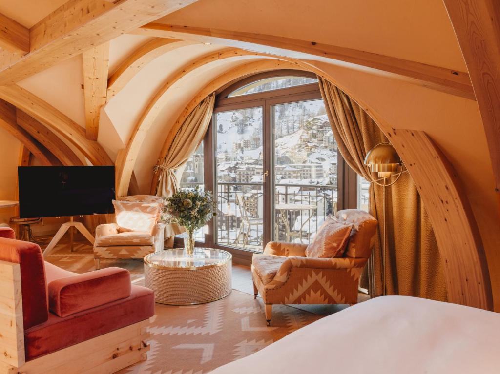 TV a/nebo společenská místnost v ubytování BEAUSiTE Zermatt