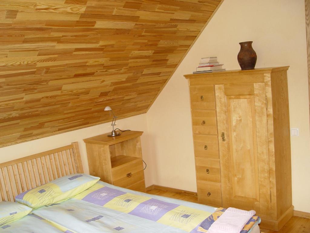 Postel nebo postele na pokoji v ubytování Aika