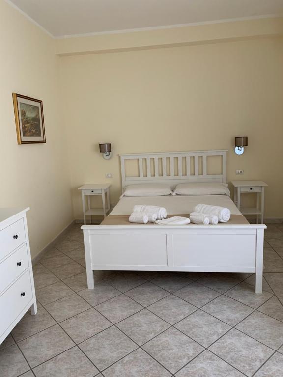 Postel nebo postele na pokoji v ubytování Casa Tacconi