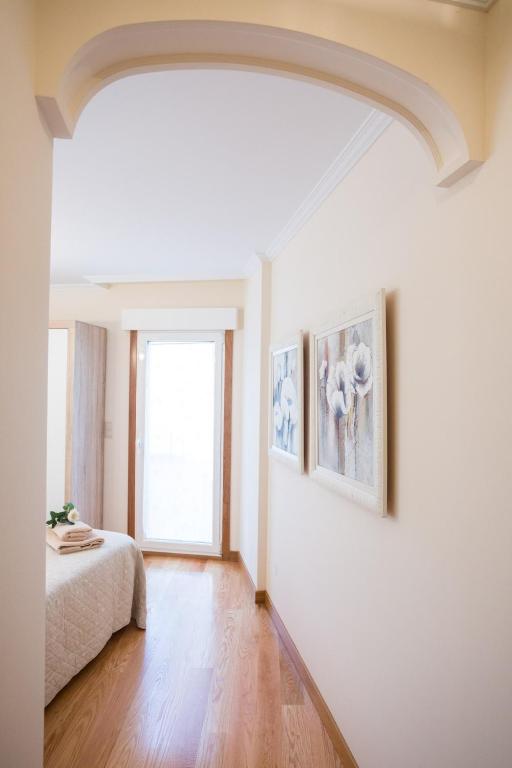 Posteľ alebo postele v izbe v ubytovaní Casa Goros