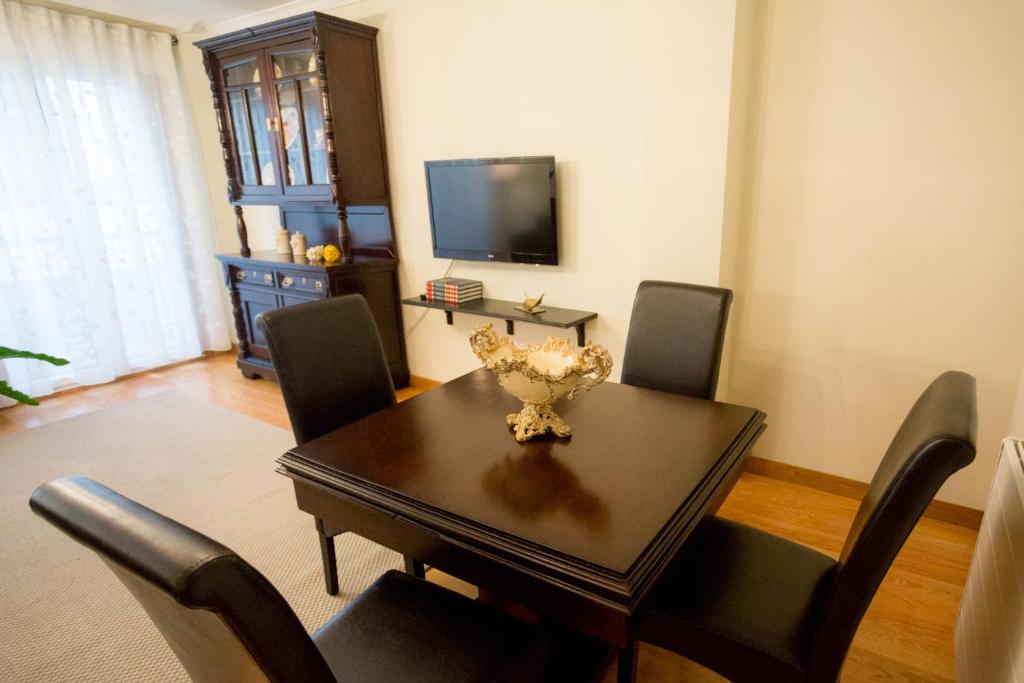 Televízia a/alebo spoločenská miestnosť v ubytovaní Casa Goros
