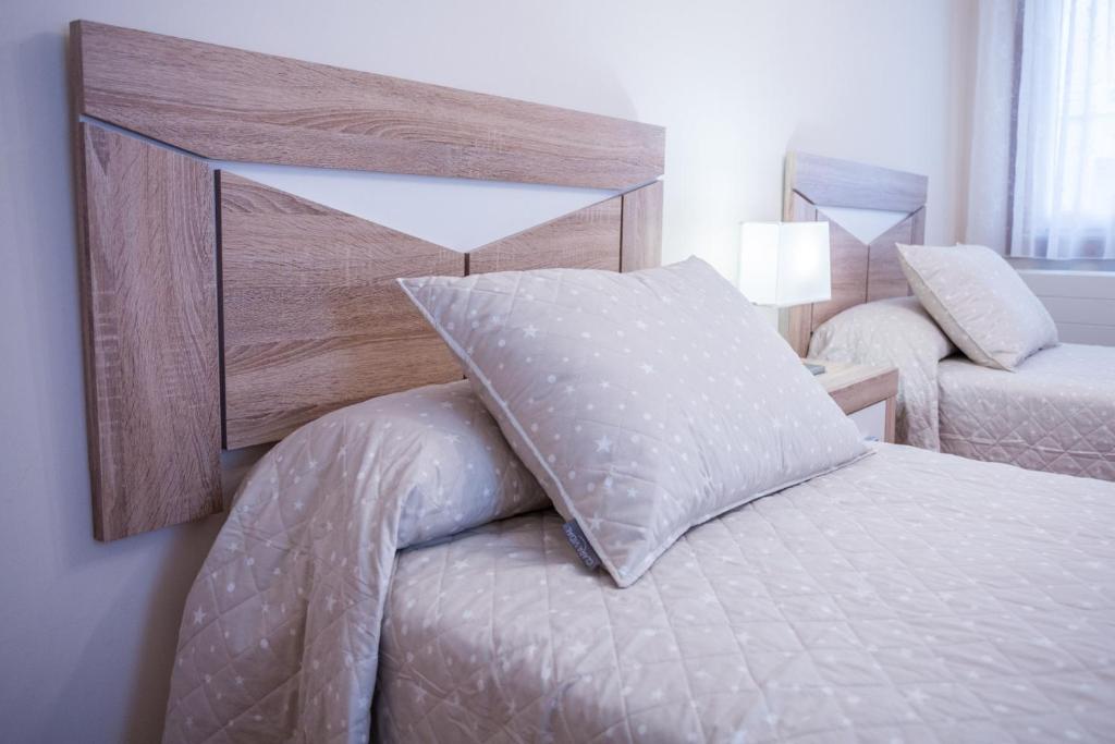 Posteľ alebo postele v izbe v ubytovaní Casa Goros