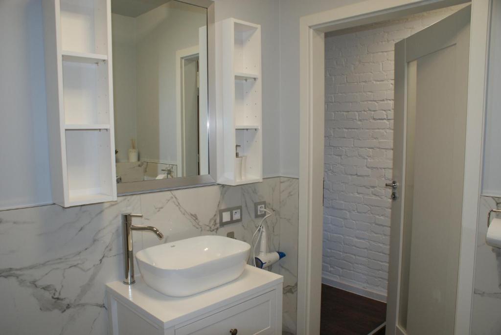 Kúpeľňa v ubytovaní APARTAMENT CENTRUM OLSZTYNA 2
