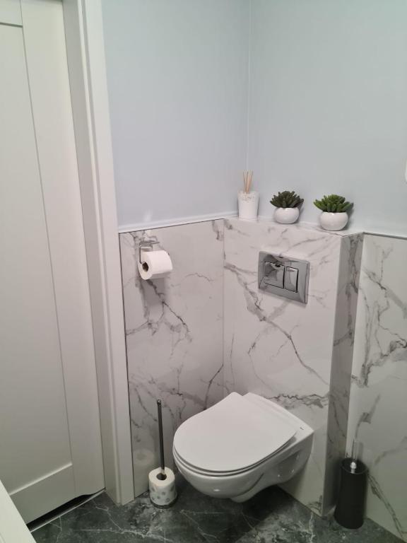 Kúpeľňa v ubytovaní APARTAMENT CENTRUM OLSZTYNA 2
