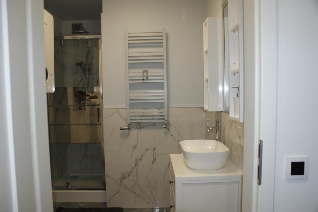Kúpeľňa v ubytovaní APARTAMENT CENTRUM OLSZTYNA 2