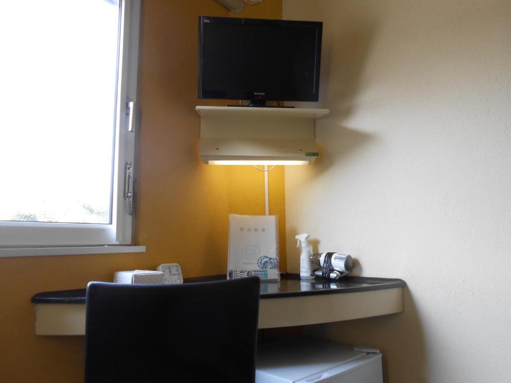 TV a/nebo společenská místnost v ubytování Select Inn Numazu