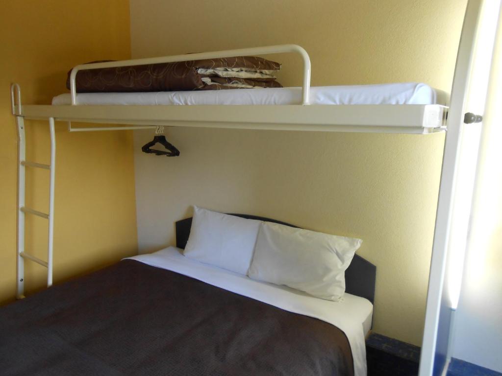 Postel nebo postele na pokoji v ubytování Select Inn Numazu