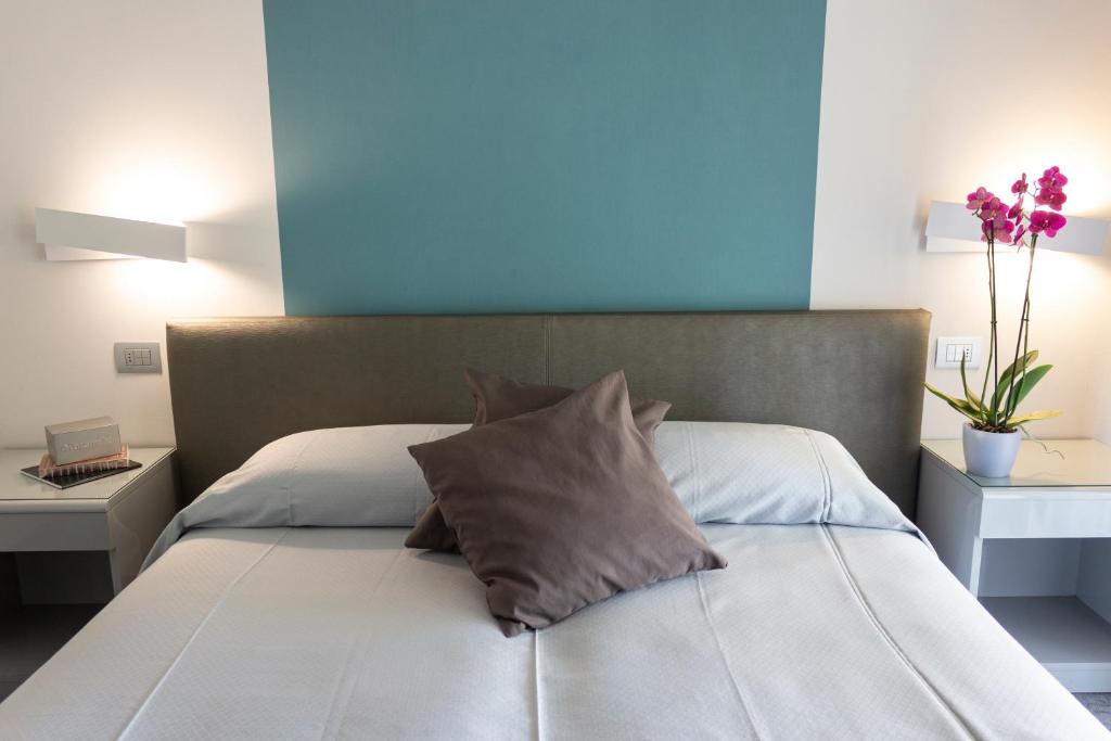 Postel nebo postele na pokoji v ubytování Hotel Désirée - Garda Lake Collection