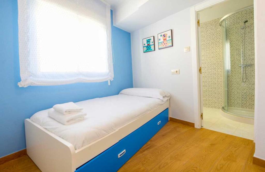 Postel nebo postele na pokoji v ubytování Ático Welcome Playa Panadeira