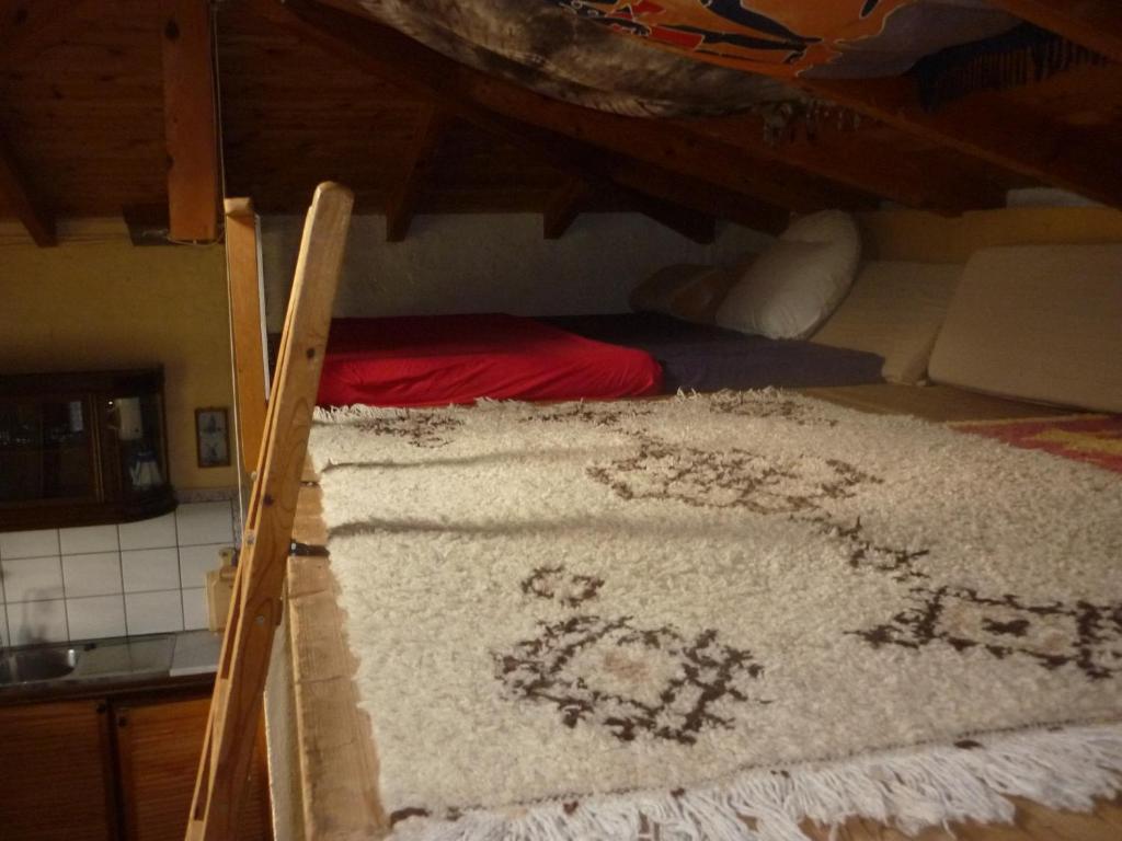 Postel nebo postele na pokoji v ubytování Studio south Pilion