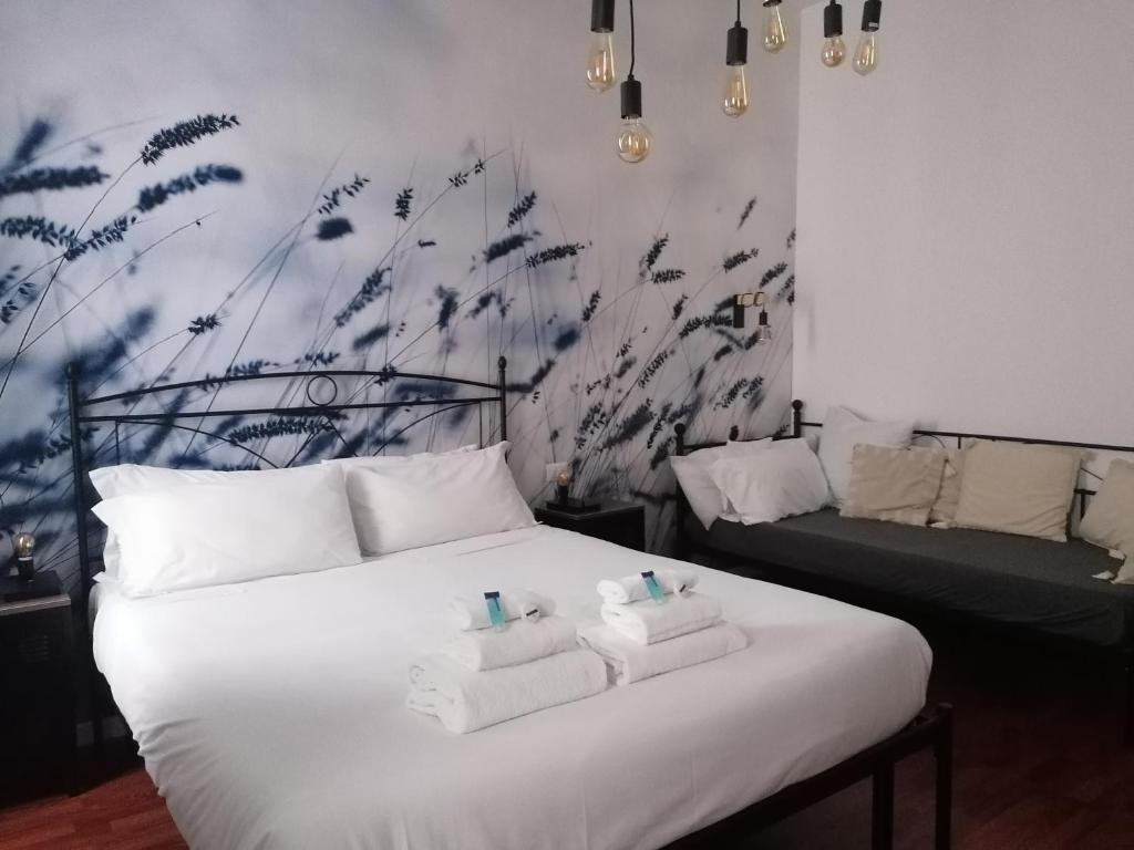 Posteľ alebo postele v izbe v ubytovaní appartamento al centro di Roma Bosuiterome