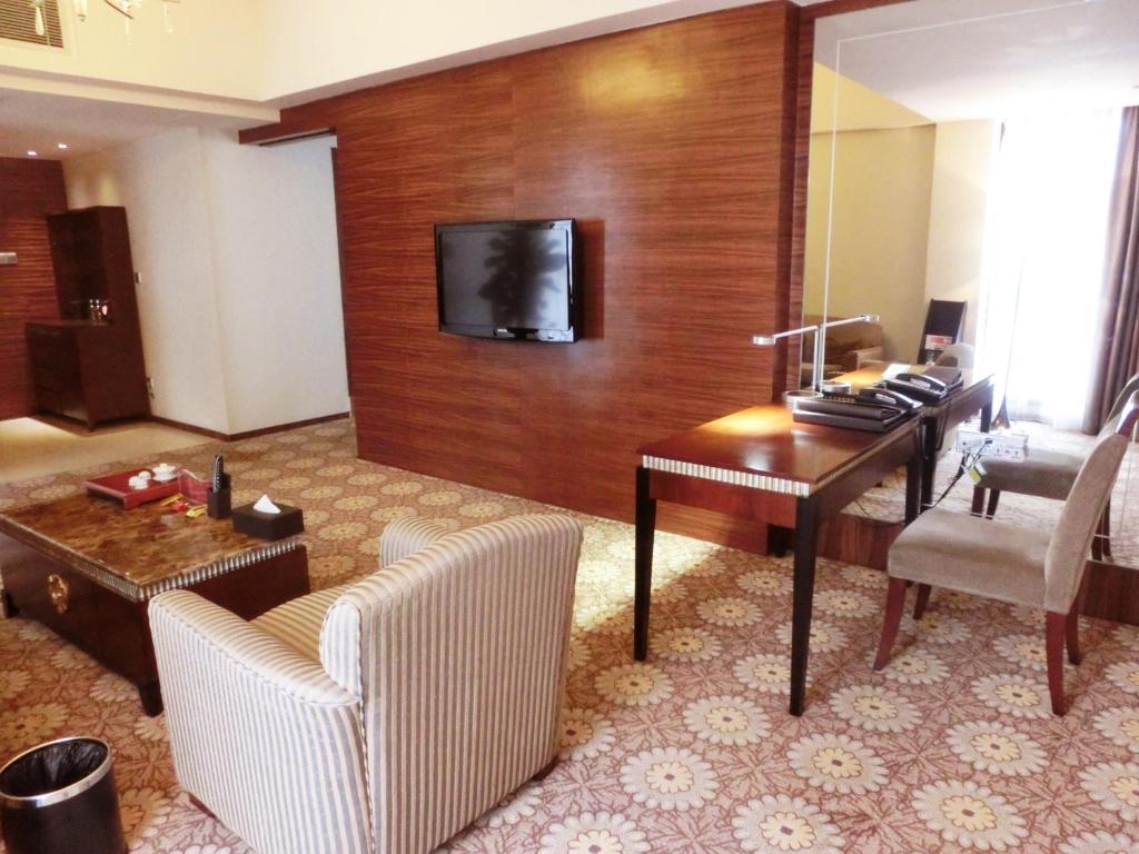 TV a/nebo společenská místnost v ubytování Guangzhou Good International Hotel