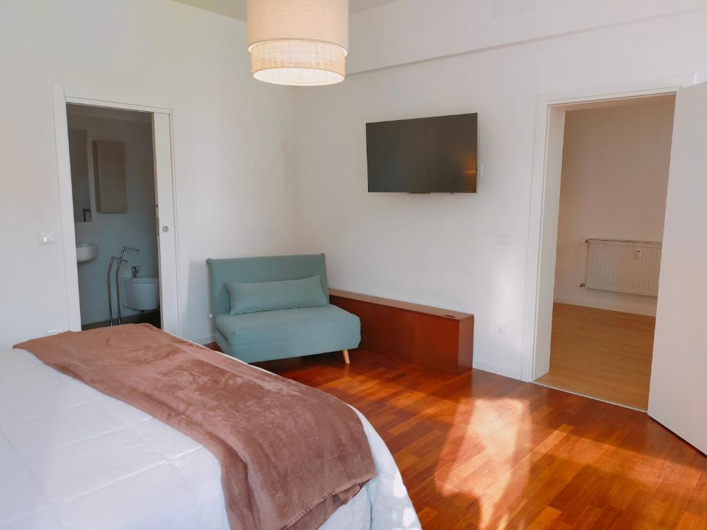 A bed or beds in a room at Ca' Palazzo
