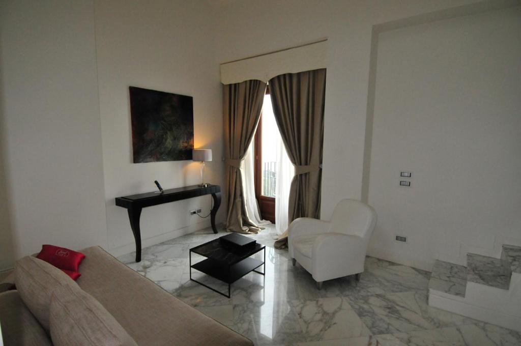 TV a/nebo společenská místnost v ubytování Hotel Metropole Taormina