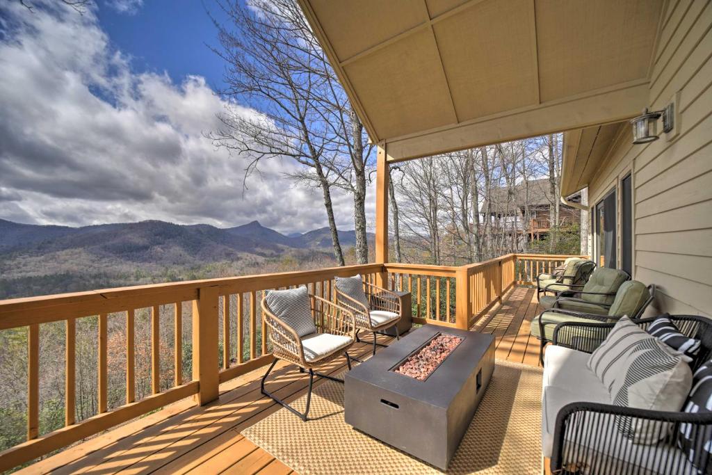 a balcony with chairs and a table with a view at Bright Sapphire Escape Near Hiking and Golfing! in Sapphire
