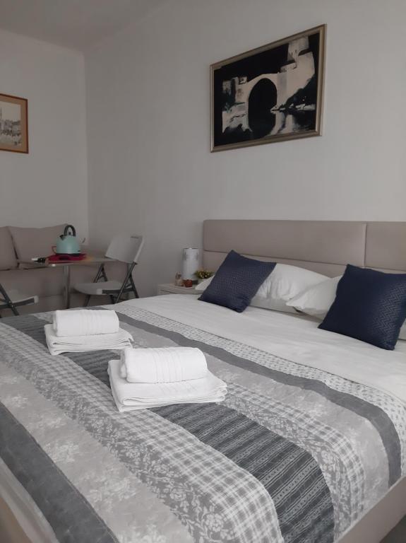Postel nebo postele na pokoji v ubytování Guest House Vanja