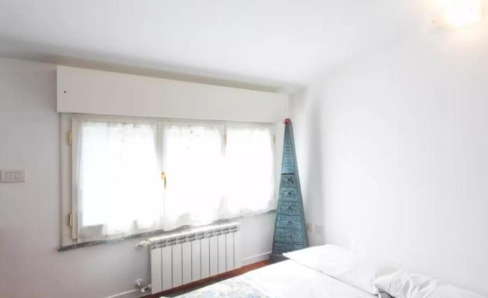 Posteľ alebo postele v izbe v ubytovaní Vintage apartment in Corvetto area