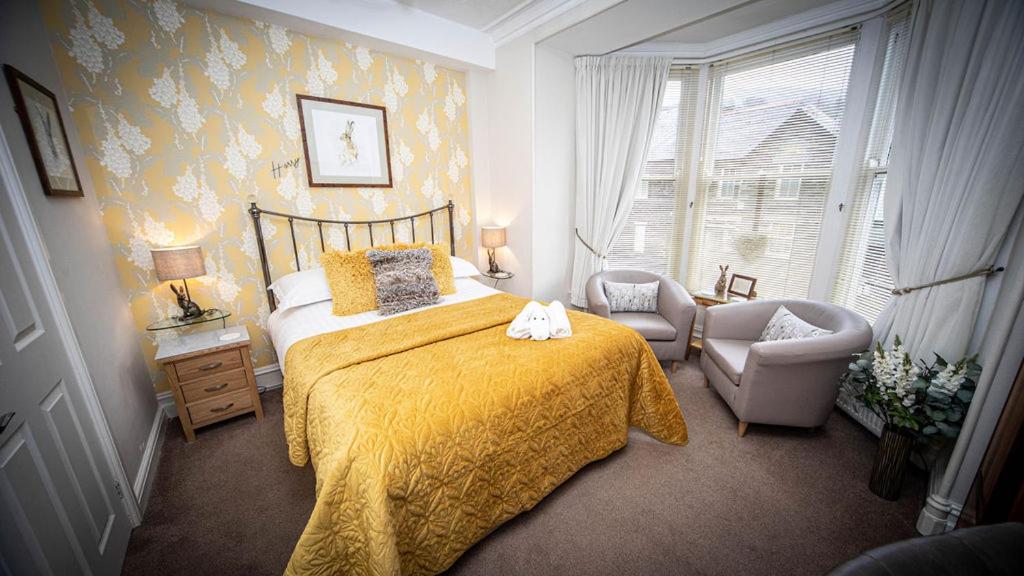 Кровать или кровати в номере Hillsdale B&B in Ambleside