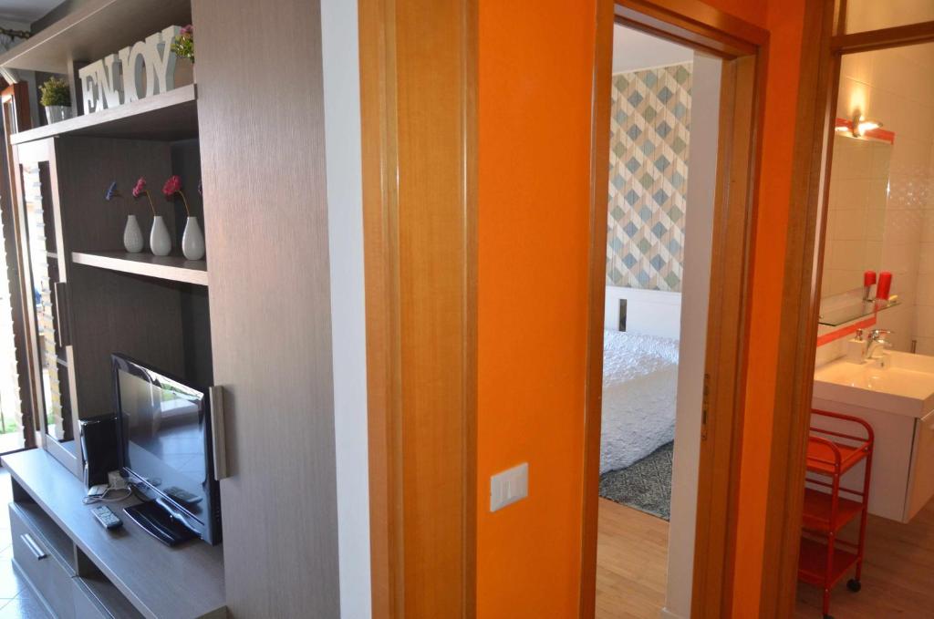 Łóżko lub łóżka w pokoju w obiekcie Montello Apartment Noale