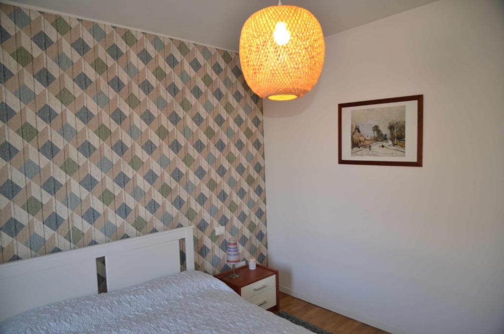 Łóżko lub łóżka w pokoju w obiekcie Montello Apartment Noale