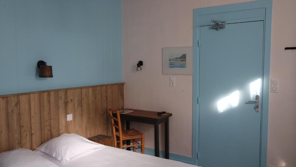 Postel nebo postele na pokoji v ubytování Hotel Le Colibri