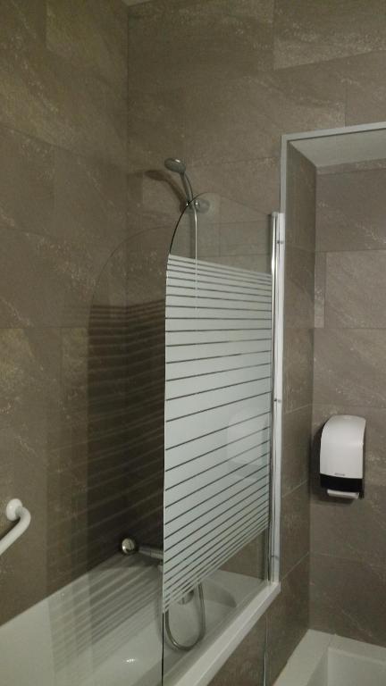 Koupelna v ubytování Hotel Le Colibri