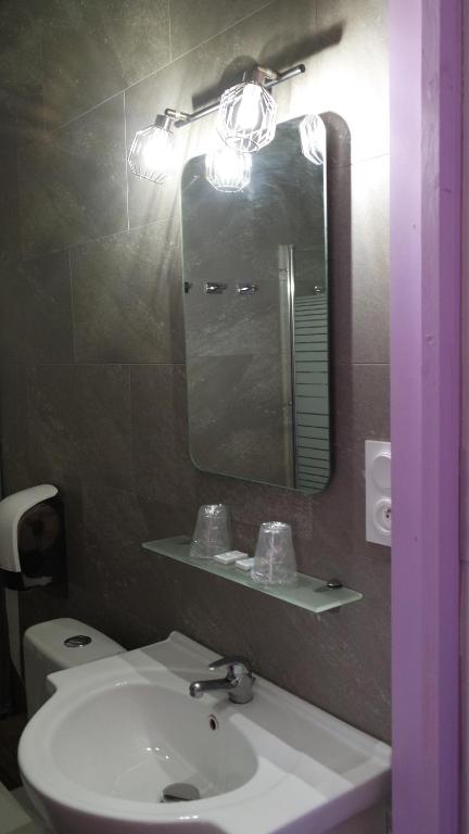 Koupelna v ubytování Hotel Le Colibri