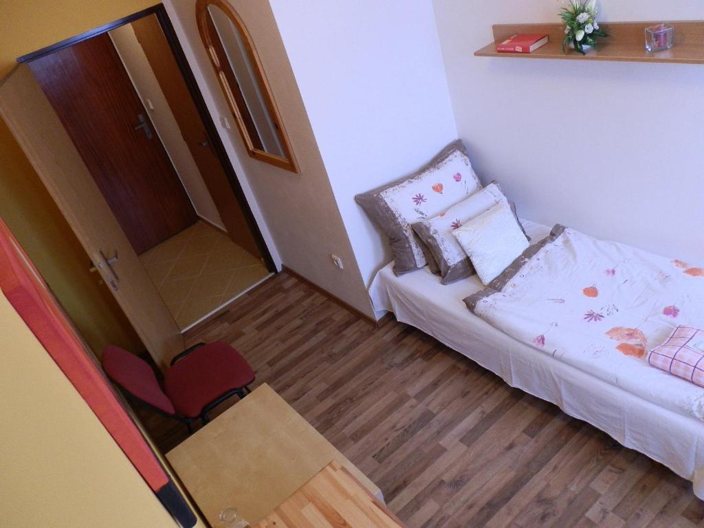 Posteľ alebo postele v izbe v ubytovaní Hotel Gól Prostějov