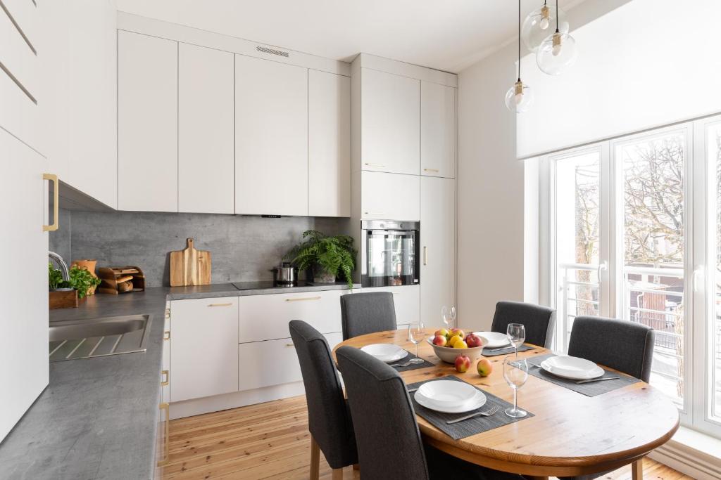 Kuchyň nebo kuchyňský kout v ubytování London - Cozy City Stay by Lion Apartments Sopot