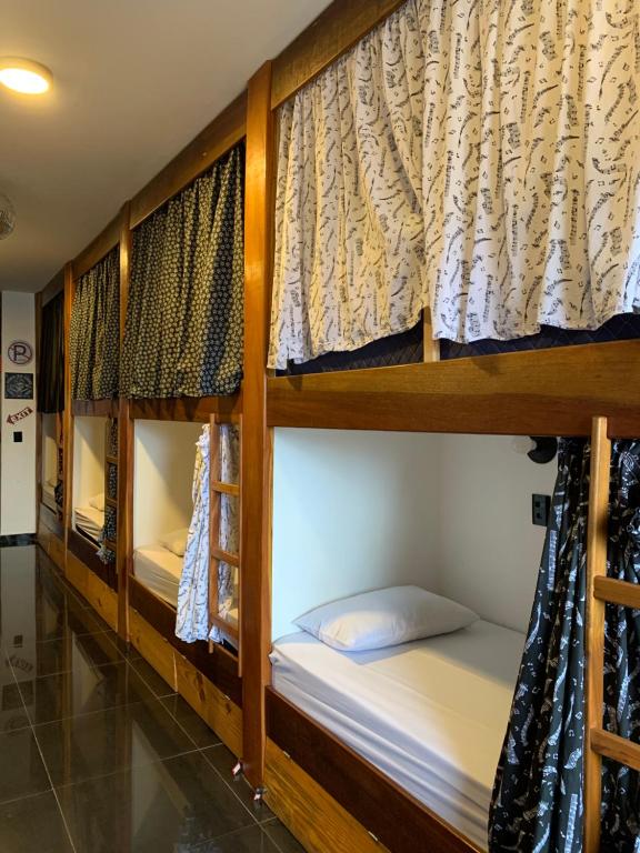 Postel nebo postele na pokoji v ubytování Utopia Hostel