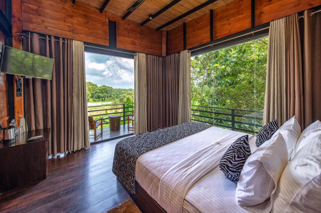 Letto o letti in una camera di Atha Resort