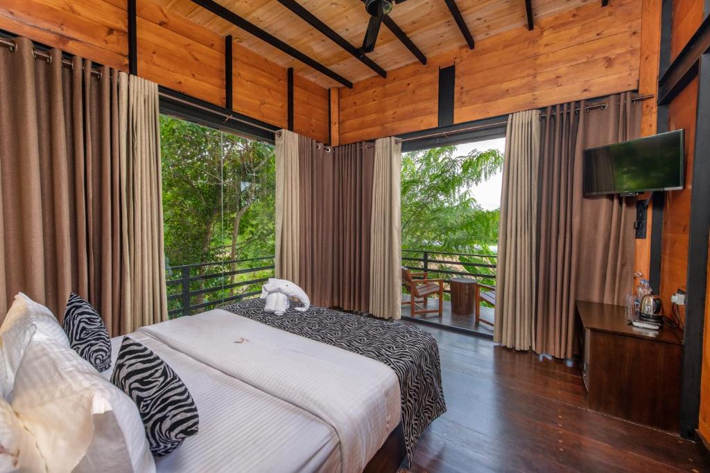 Letto o letti in una camera di Atha Resort