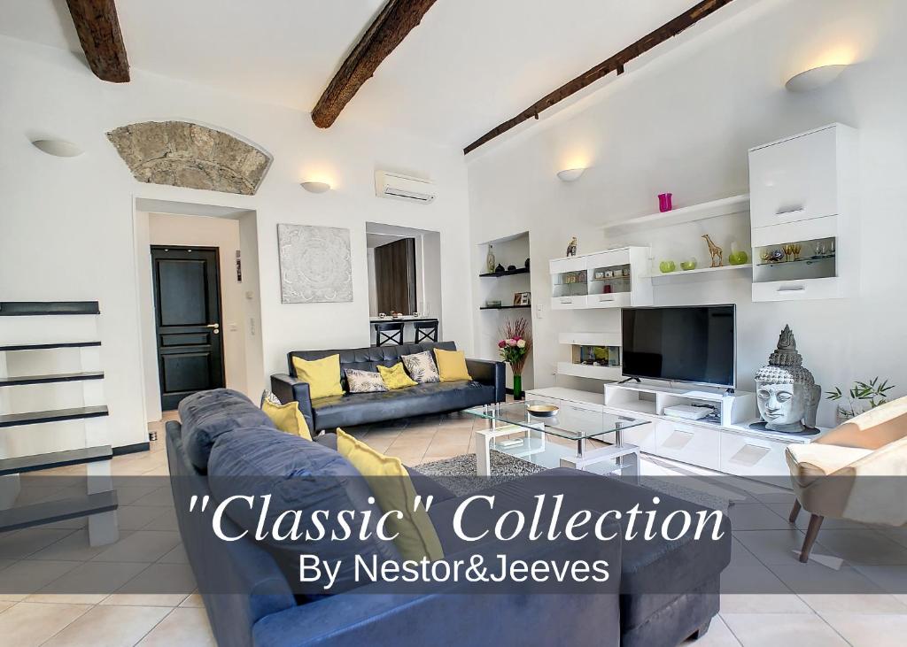 a living room with a couch and a table at Nestor&Jeeves - ZEN - Central - Very close beaches in Nice