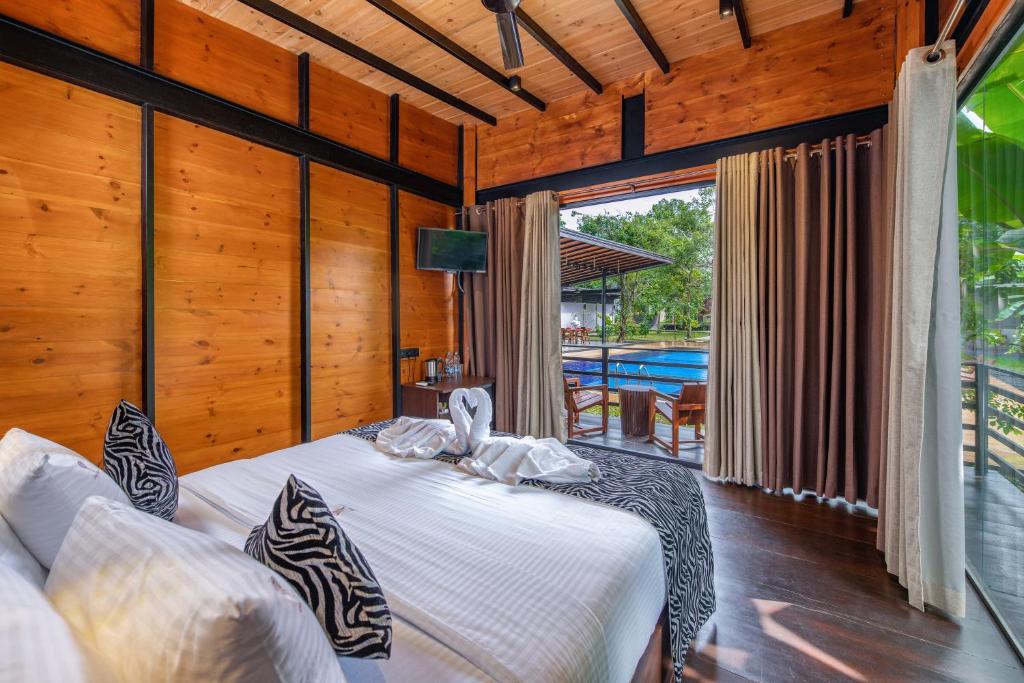 Letto o letti in una camera di Atha Resort