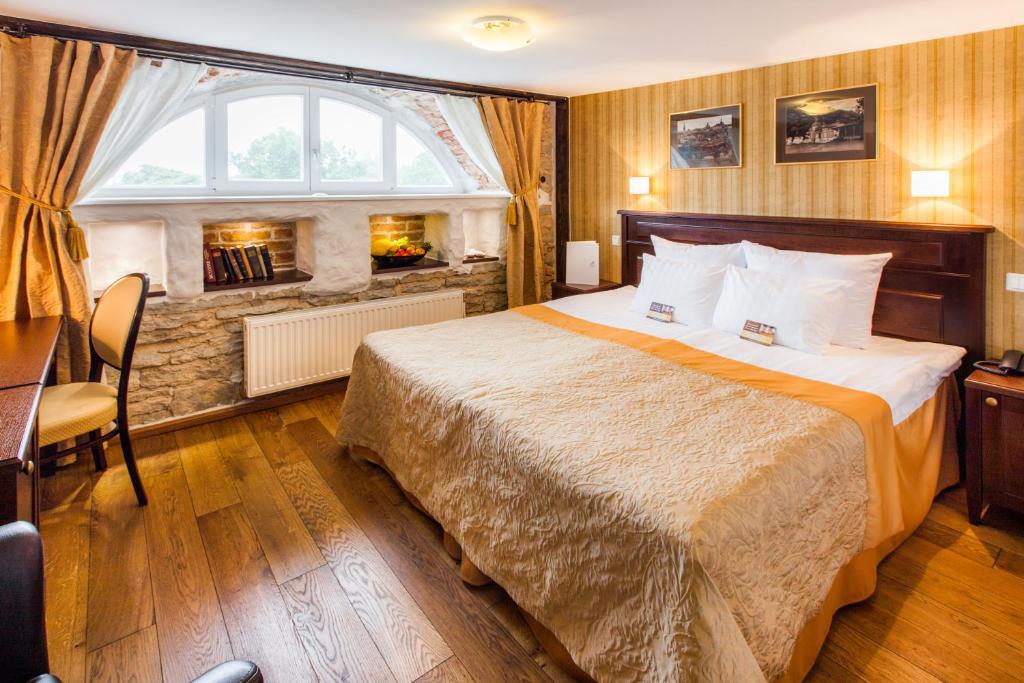 Voodi või voodid majutusasutuse The von Stackelberg Hotel Tallinn toas