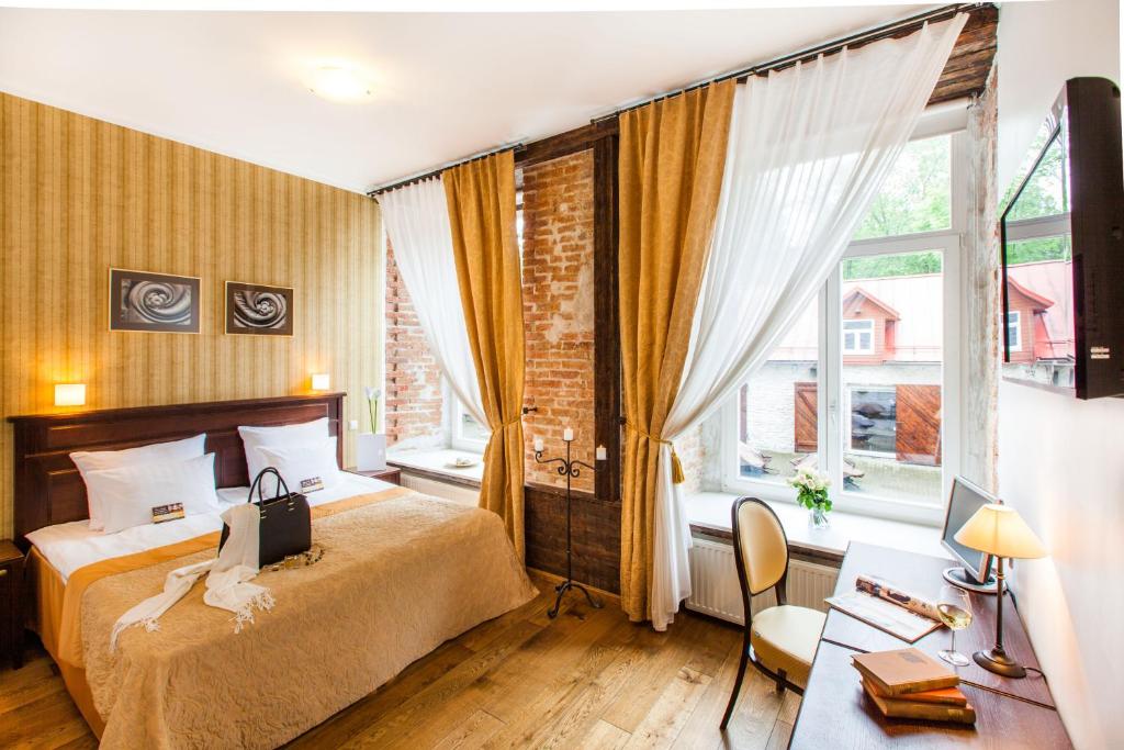 Voodi või voodid majutusasutuse The von Stackelberg Hotel Tallinn toas