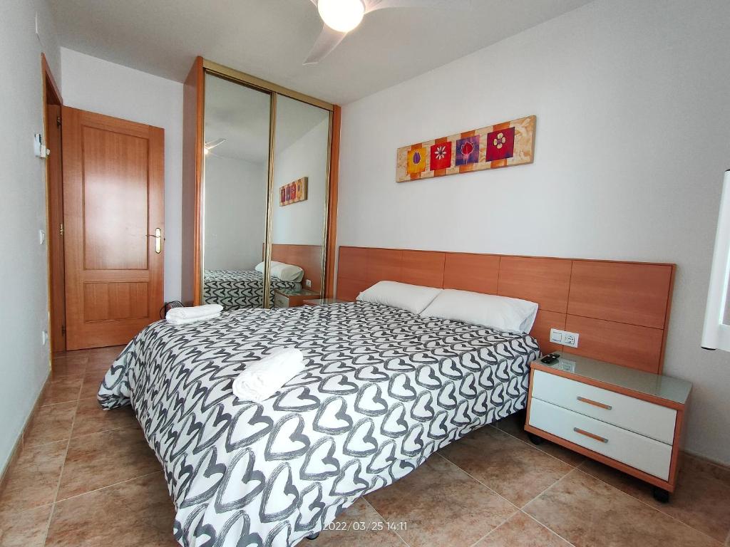 Posteľ alebo postele v izbe v ubytovaní LG Calafell Beach