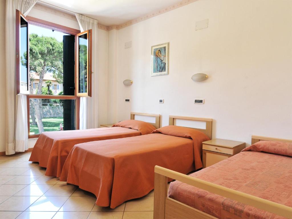 Postel nebo postele na pokoji v ubytování Albergo Bice