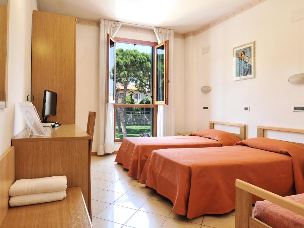 Postel nebo postele na pokoji v ubytování Albergo Bice