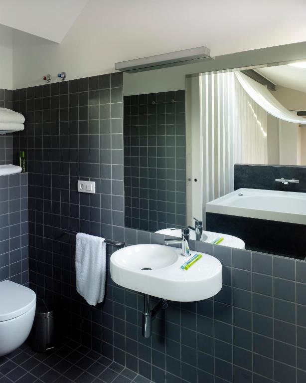 Koupelna v ubytování Moure Hotel