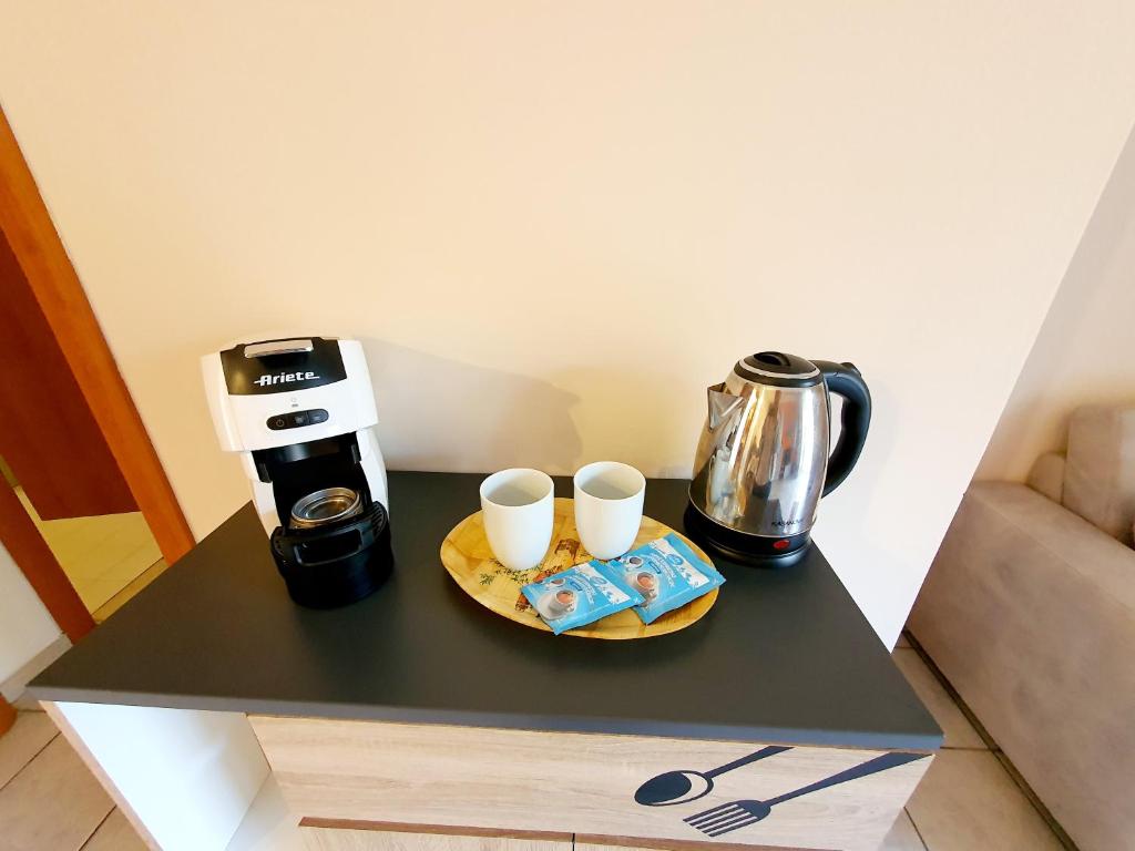 Príslušenstvo na prípravu kávy alebo čaju v ubytovaní Beach Apartment Cannobio